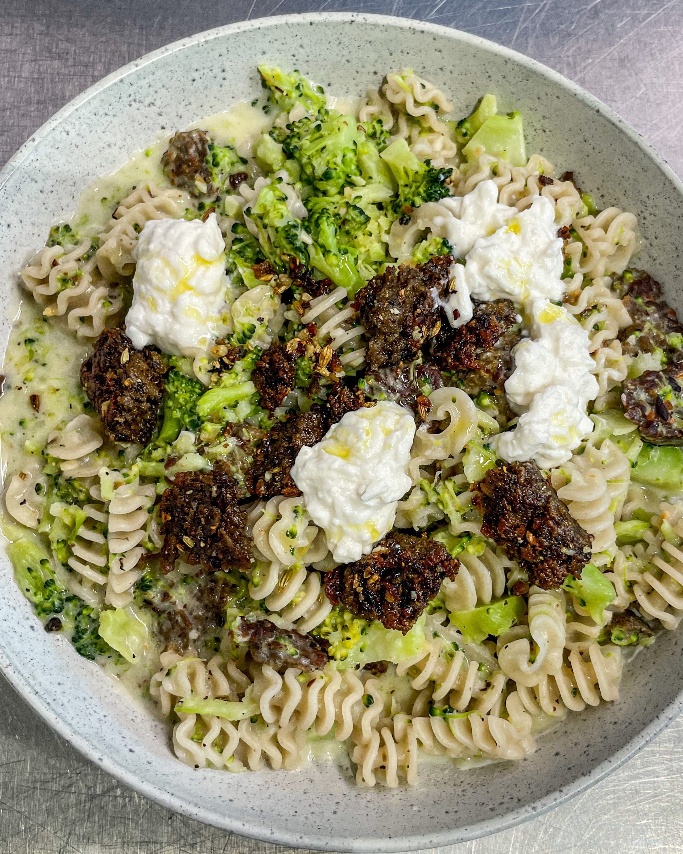 Garlic & fennel burger crumb with broccoli pasta.
